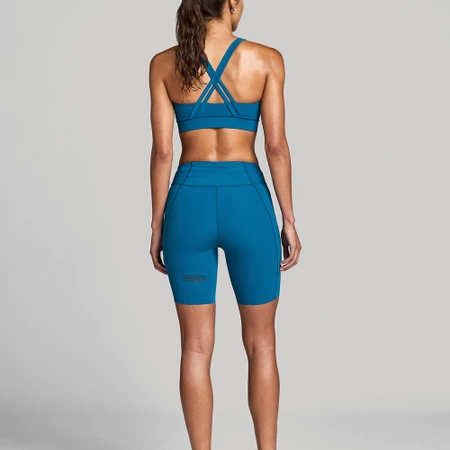 Janji Pace 7in Half Tights in Tidal