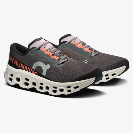 On Cloudmonster 3 in Eclipse/Orange